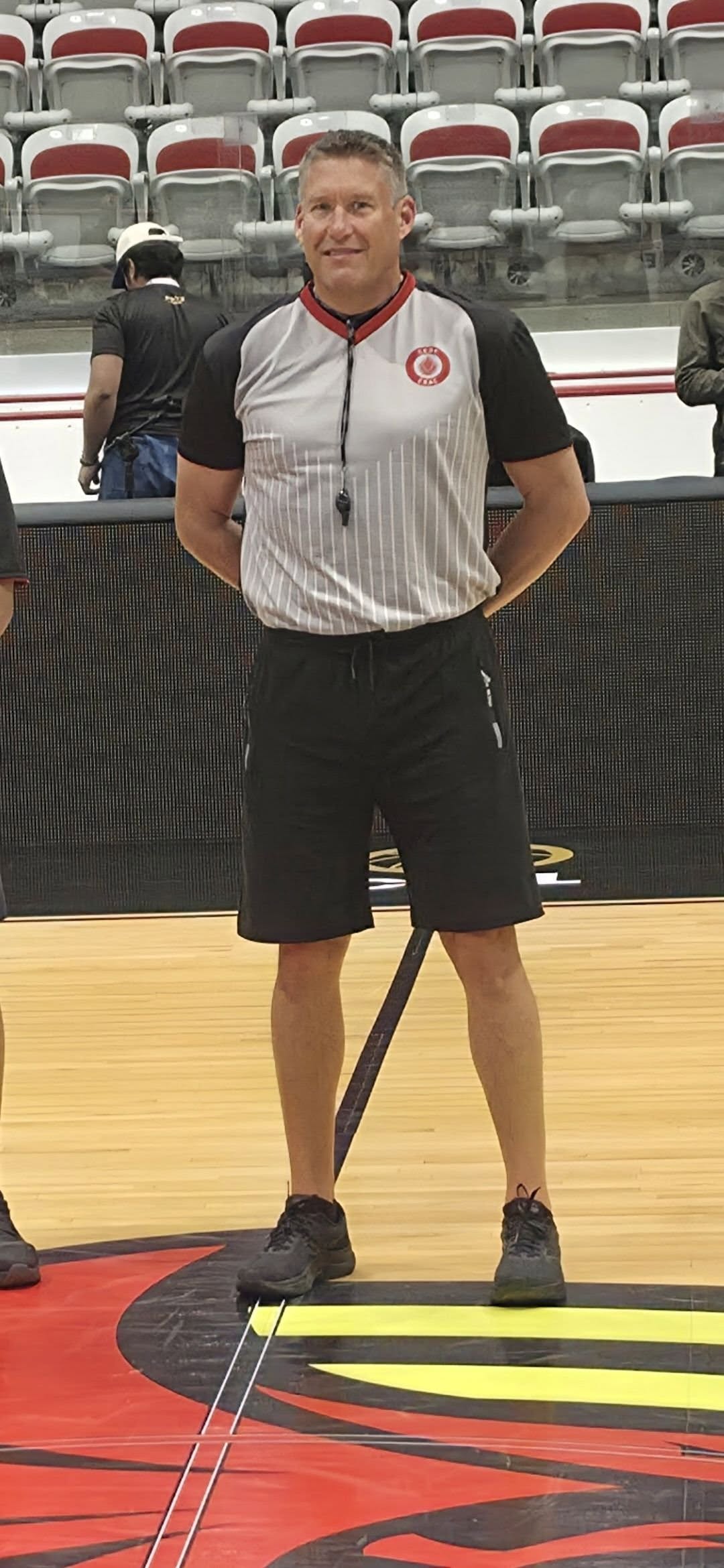Dana Gorbahn refereeing a basketball game